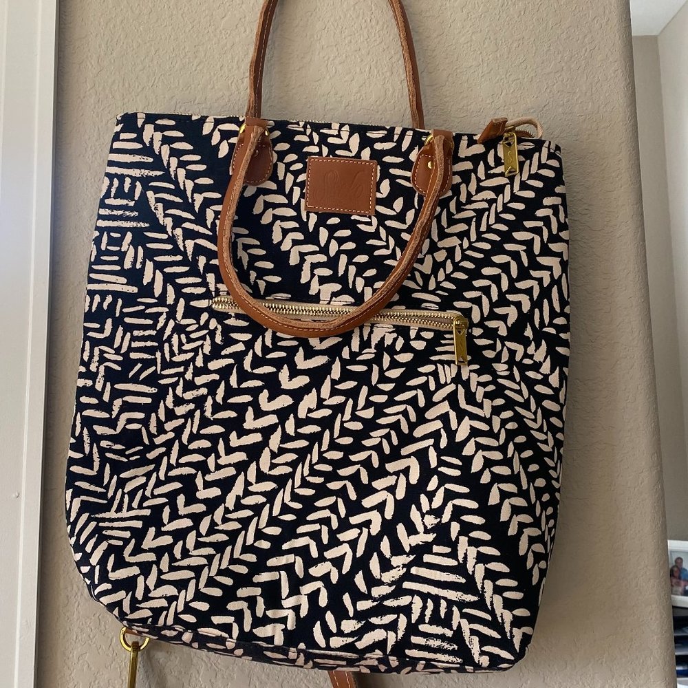 Sseko convertible tote purse/backpack with strap for luggage